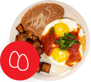 photo of breakfast plate huevos rancheros refried beans los corrales mexican restaurant in garland texas